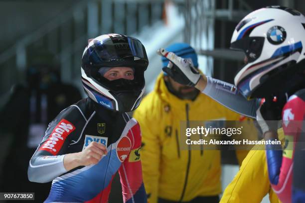 Stephanie Schneider and Annika Drazek of Germany celebrate victory at Deutsche Post Eisarena Koenigssee after winning the BMW IBSF World Cup Women`s...