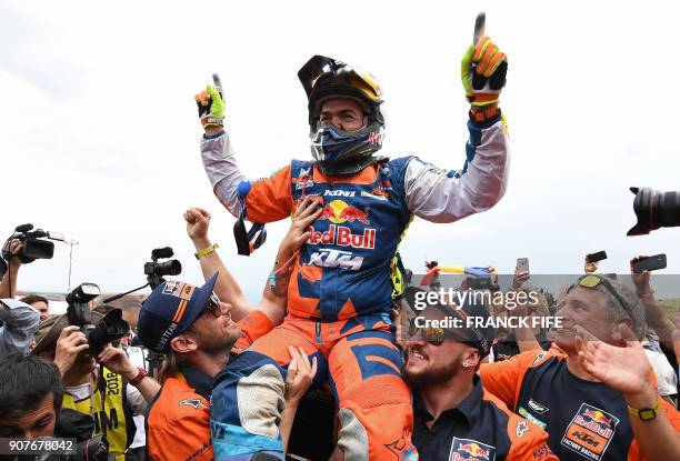 S Austrian biker Matthias Walkner celebrates after winning the Dakar Rally 2018, at the end of the last stage in and around Cordoba province in...