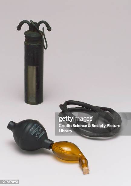 In the foreground is an inhaler for use with bronchovydrin penicillin, made by Bronchovydrin Ltd of London. In the background is a Junker�s...