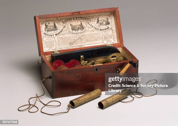 Clarke's-type machine patented by Davis and Kidder and made by W H Burnap of Lowell, Massachusetts. It has a horseshoe magnet, two rotating bobbins...