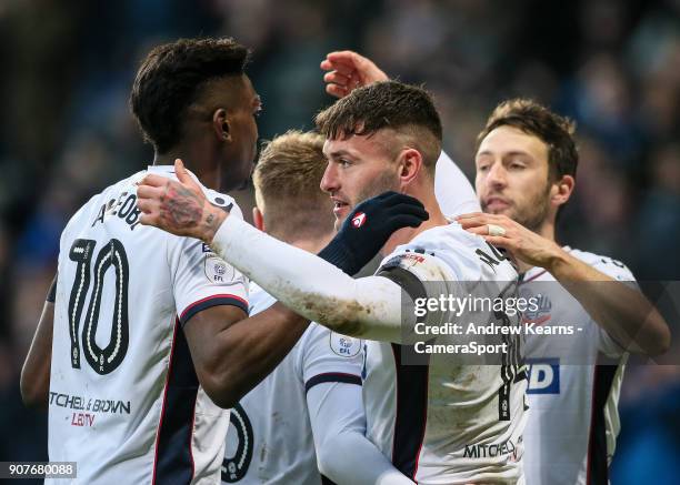 Bolton Wanderers' Gary Madine celebrates scoring his side's first goal with team mates Sammy Ameobi and Will Buckley during the Sky Bet Championship...