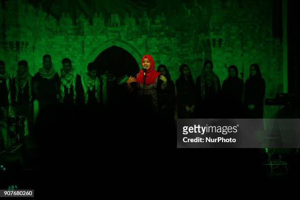 Palestinian singer performs on stage during the Palestinian Music Festival in Gaza City on January 20, 2018