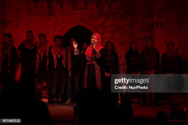 Palestinian singer performs on stage during the Palestinian Music Festival in Gaza City on January 20, 2018