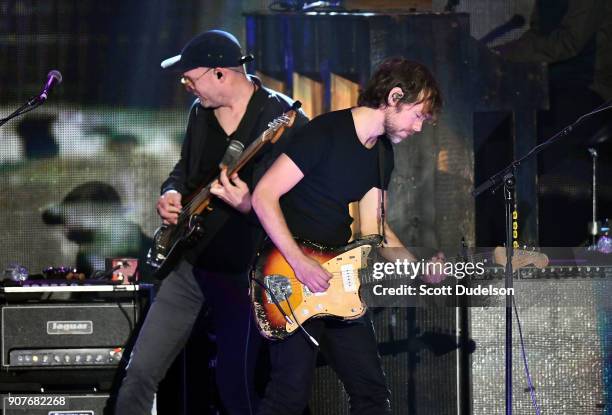 Bass player Scott Devendorf and guitarist Aaron Dessner of the band The National perform onstage during the iHeartRadio ALTer EGO concert at The...