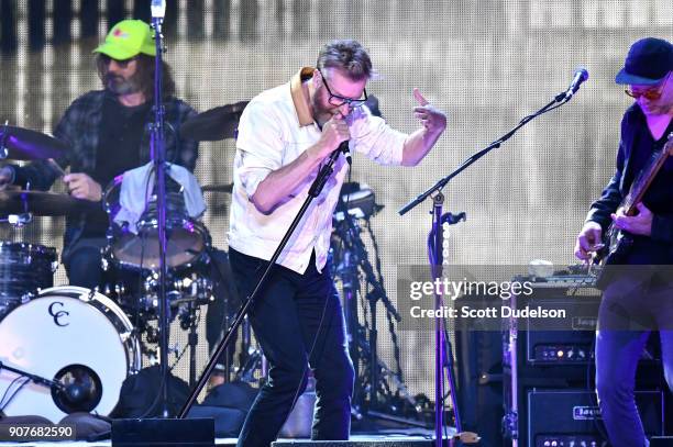 Musicians Bryan Devendorf, Matt Berninger and Scott Devendorf of the band The National perform onstage during the iHeartRadio ALTer EGO concert at...