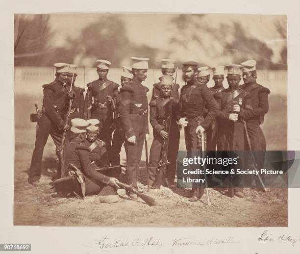 Photograph of a group of Gurkha soldiers with their British officer, taken by Felice Beato during the Indian Mutiny or Great Sepoy Rebellion . The...