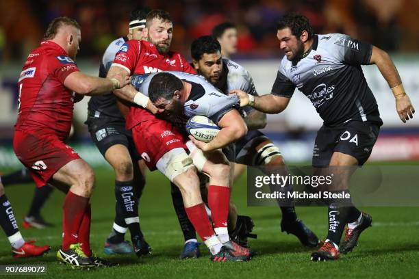 Marcel van der Merwe of Toulon i held up by John Barclay of Saracens during the European Rugby Champions Cup match between Scarlets and RC Toulon at...