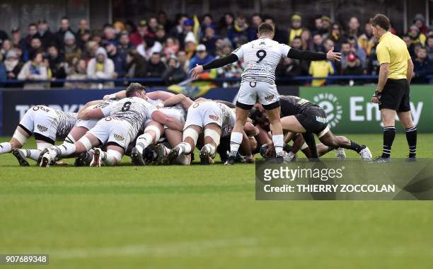 Players form a scrum in the European Rugby Champions Cup, Clermont versus Ospreys Rugby Union match at the Michelin stadium in Clermont-Ferrand,...