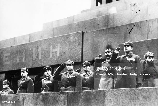 Red Army chiefs watch monster demonstration of Russia's military and industrial might paraded on 18th anniversary of revolution. Watched by Stalin,...