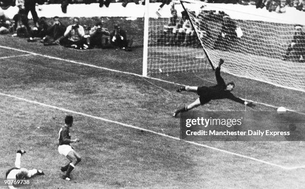 The 1966 World Cup football championship was held in England. In this semi-final match, Russian world cup veteran goalkeeper Lev Yashin is beaten by...