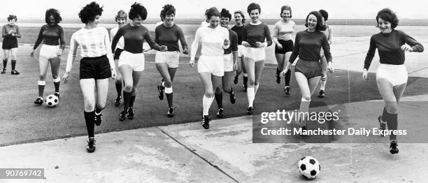 The 1966 World Cup football championship was held in England. Here, air and ground stewardesses with British European Airways model the competition...