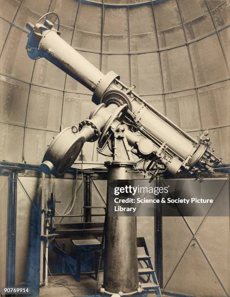 Photograph of an equatorially mounted heliometer, of 7 inch aperture, at the Cape Observatory, in South Africa. Made by Repsold and Sons, Hamburg in...