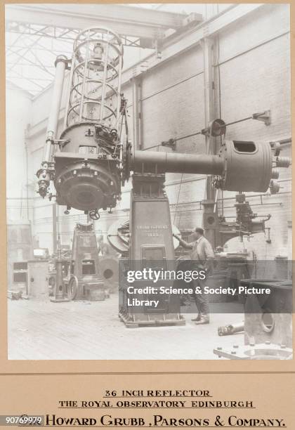 Photograph showing the interior of the optical factory works of the company of Sir Howard Grubb, Parsons and Co in Newcastle-upon-Tyne, England....