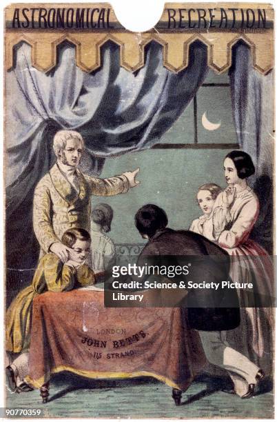 Coloured lithograph by the Leighton Brothers from the cover of an educational game, showing a family examining a star chart and relating it to the...
