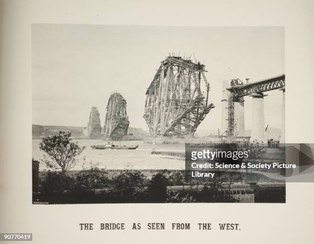Photograph of the Forth Railway Bridge under construction, seen from South Queensferry, Scotland, taken by an unknown photographer in 1887. This...
