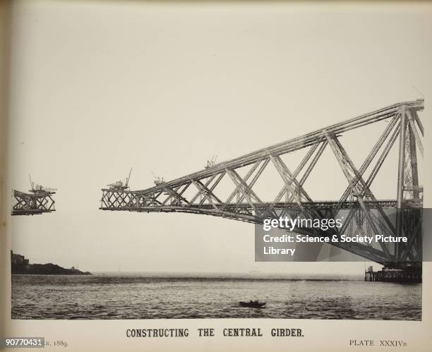 Photograph showing the construction of the central span to the Forth Railway Bridge, from 'The Forth Bridge In Its Various Stages Of Construction And...