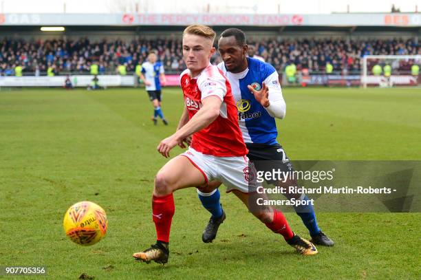 Fleetwood Town's Kyle Dempsey competes with Blackburn Rovers' Ryan Nyambe during the Sky Bet League One match between Fleetwood Town and Blackburn...