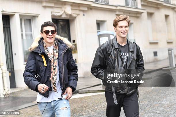 Nick Truelove and model arrive at Balmain Homme Menswear Fall/Winter 2018-2019 show as part of Paris Fashion Week on January 20, 2018 in Paris,...