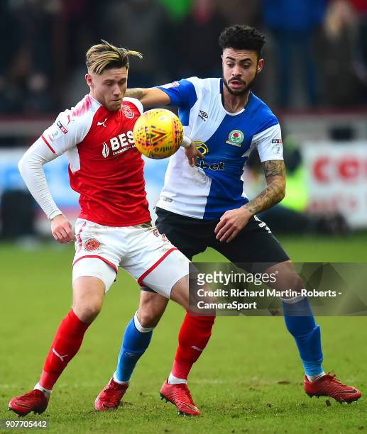 Blackburn Rovers' Derrick Williams vies for possession with Fleetwood Town's Wes Burns during the Sky Bet League One match between Fleetwood Town and...