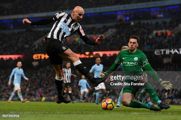 Ederson of Manchester City saves a shot from Jonjo Shelvey of Newcastle United during the Premier League match between Manchester City and Newcastle...