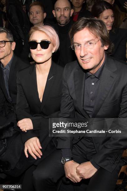 Noomi Rapace an Pietro Beccari attend the Dior Homme Menswear Fall/Winter 2018-2019 show as part of Paris Fashion Wee January 20, 2018 in Paris,...