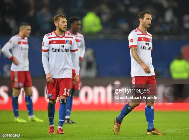 Aaron Hunt and Dennis Diekmeier of Hamburg look dejected during the Bundesliga match between Hamburger SV and 1. FC Koeln at Volksparkstadion on...