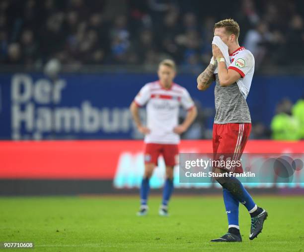 Andre Hahn of Hamburg looks dejected after the second goal during the Bundesliga match between Hamburger SV and 1. FC Koeln at Volksparkstadion on...