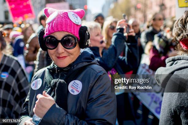Protesters march wearing the "Pussy Hat" during the 2018 Women's March On New York City at Central Park West on January 20, 2018 in New York City.