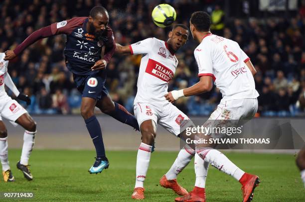 Monpellier's ivorian forward Giovanni Sio heads the ball during the French L1 football match between Montpellier and Toulouse on January 20 at the La...