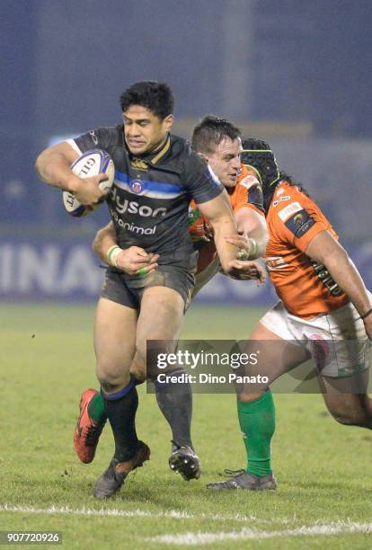 Ben Tapuai of Bath Rugby his tackled during the European Rugby Champions Cup match between Benetton Rugby and Bath Rugby at Stadio Comunale Monigo on...