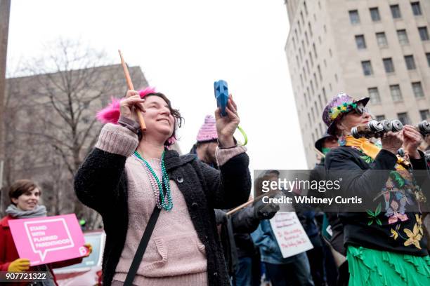 Jackie Wallach and Eileen Merrifield of Joia World Percussion play music during the Women's March for Truth on January 20, 2018 in St Louis,...