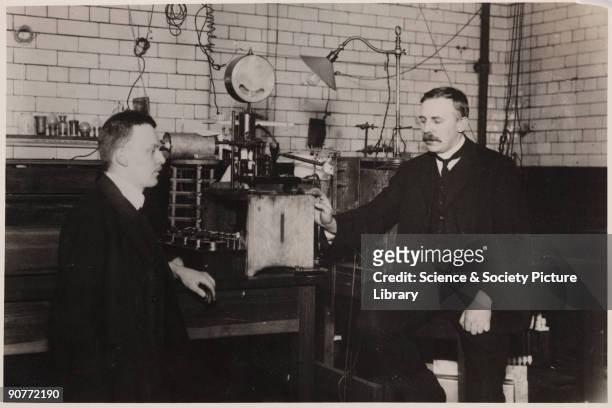 Photograph of Rutherford and Geiger with their apparatus for counting alpha particles. Born in New Zealand, Ernest Rutherford was a pioneering...