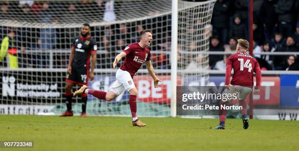 Chris Long of Northampton Town celebrates after scoring his sides second goal during the Sky Bet League One match between Northampton Town and Milton...