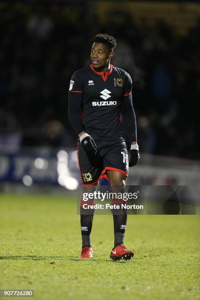 Chuks Aneke of Milton Keynes Dons walks dejectedly from the pitch after being shown a red card during the Sky Bet League One match between...
