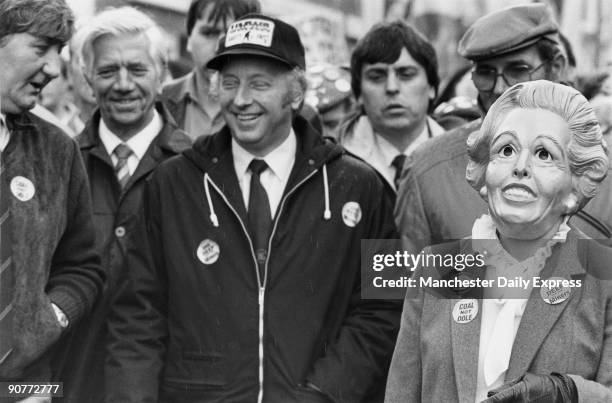 National Union of Mineworkers� General Secretary Arthur Scargill amused by a supporter wearing a Margaret Thatcher mask during a demonstration...