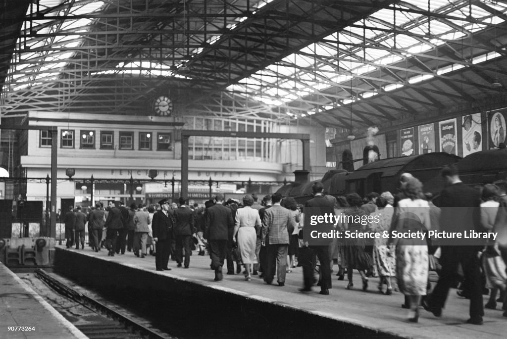 Passengers arriving at Liverpool Street station, London, 9.00 am, 29 June 1949.