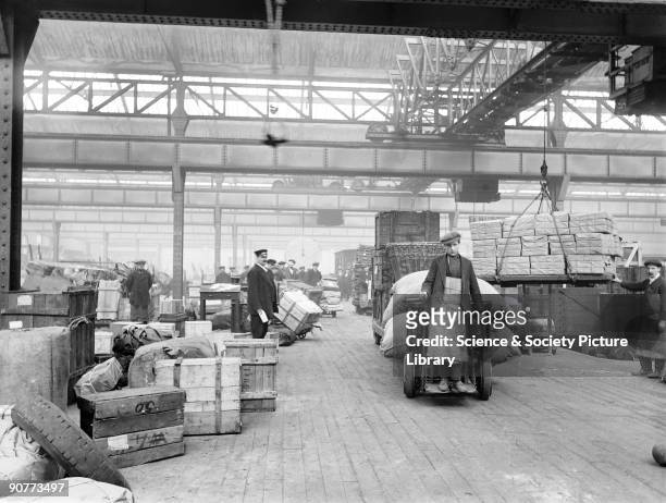 Workers inside Oldham Road goods depot, which started life as a station in 1839 but after 4 years it was closed and turned into a goods depot. This...