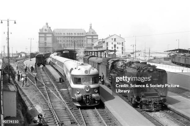 Photograph by Peter Bawcutt showing diesel and steam powered locomotives. This station is the largest in Turkey and was built by German architects...