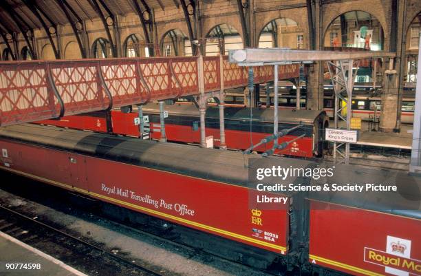 Travelling Post Office at King's Cross Station, by Lynn Patrick, 1997. Post office trains had been used since the coming of the railways. The letters...