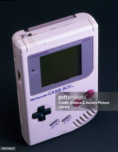 Hand-held games console with 'Tetris' game cartridge, made by Nintendo, Japan.
