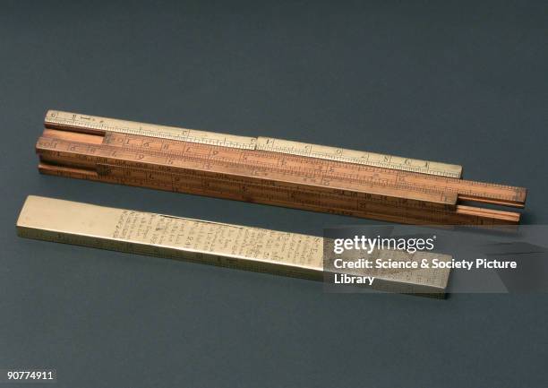 Square ullage slide rule, with additional engineering data on sliding brass scales, made by Edward Roberts of Dove Court, Old Jewry, London. Ullage...