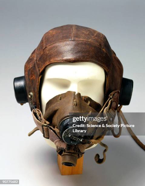 Leather flying helmet with 10A/12401 headphones, an oxygen mask and a 10A/12570 microphone. At the outbreak of WWII , flying helmets had changed...