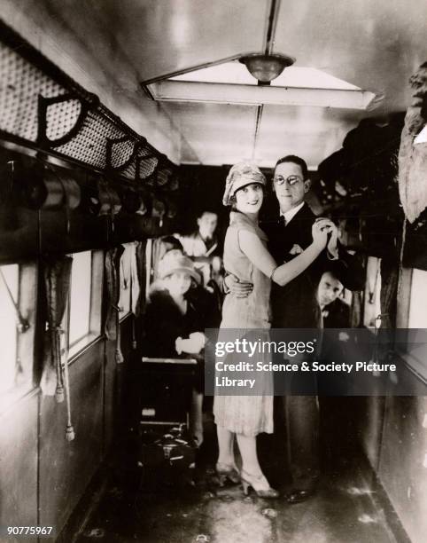 Mr Granville, inventor of this version of the Charleston dance routine, "takes a pupil through her paces on board an Imperial Airways London-Paris...