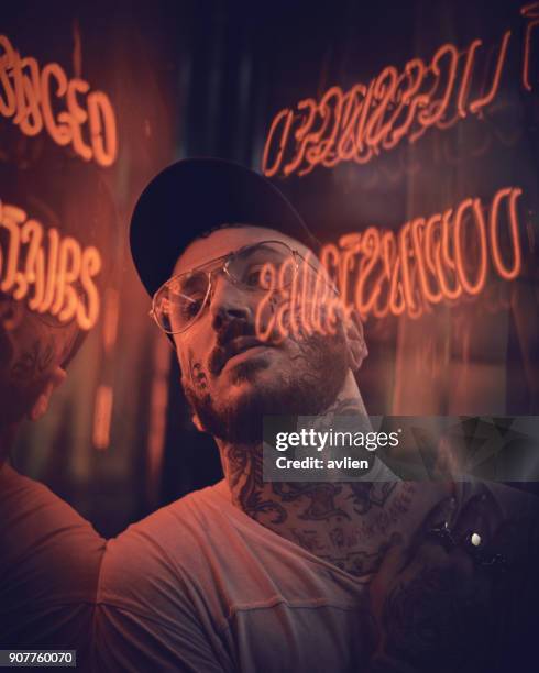 Close-Up Of Man Seen From Glass With Reflection