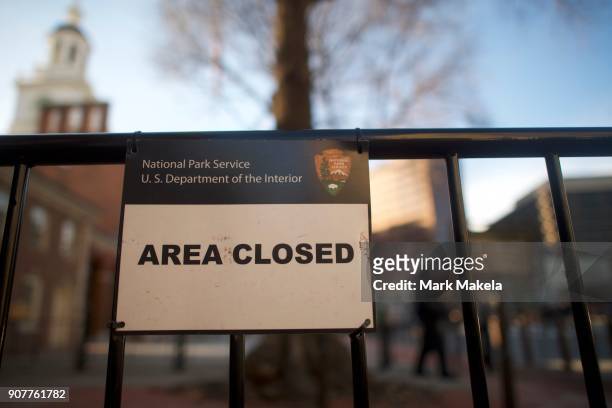 Closed sign is posted in front of the shuttered Independence Hall after the government shutdown on January 20, 2018 in Philadelphia, Pennsylvania. As...