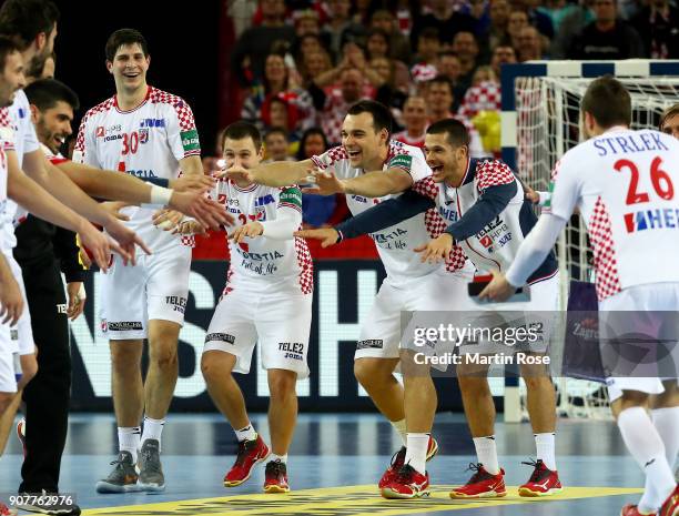 Team members of Croatia celebrate victory after the Men's Handball European Championship main round match between Croatia and Norway at Arena Zagreb...