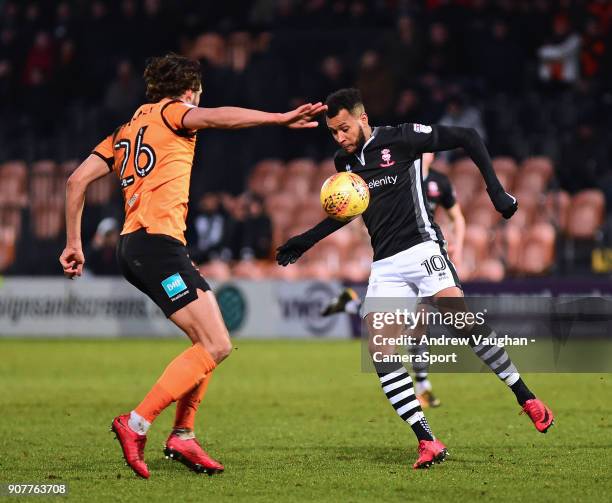 Lincoln City's Matt Green vies for possession with Barnet's Dan Sweeney during the Sky Bet League Two match between Barnet and Lincoln City at The...