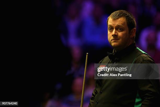 Mark Allen reacts during the Semi-Final match between Mark Allen and John Higgins on Day Seven of The Dafabet Masters at Alexandra Palace on January...