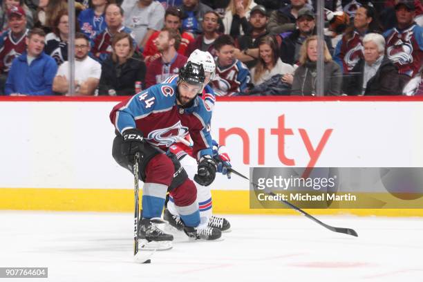 Mark Barberio of the Colorado Avalanche skates against J.T. Miller of the New York Rangers at the Pepsi Center on January 20, 2018 in Denver,...
