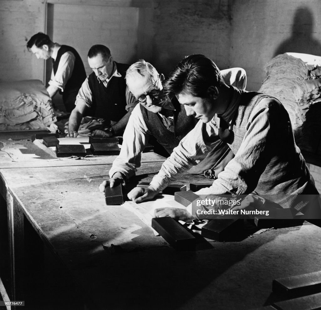 Stretching leather, master and apprentice, Leather works, 1952.